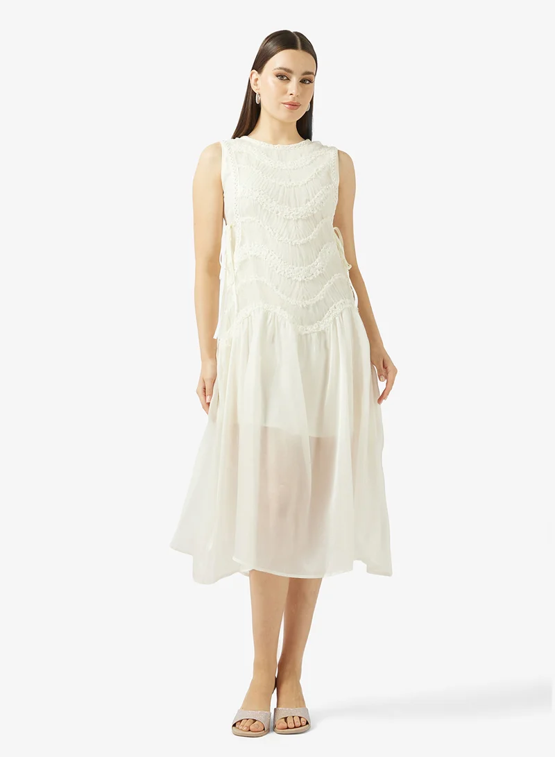 Sleeveless Dress With Sheer Hem